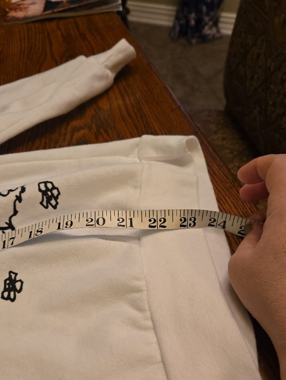 Peanuts White Sweatshirt with Black Snoopy Illustration - Picture 8 of 8